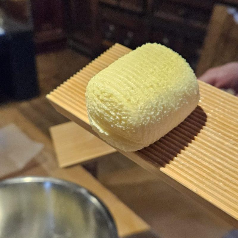 Butter churning in Broadway Museum